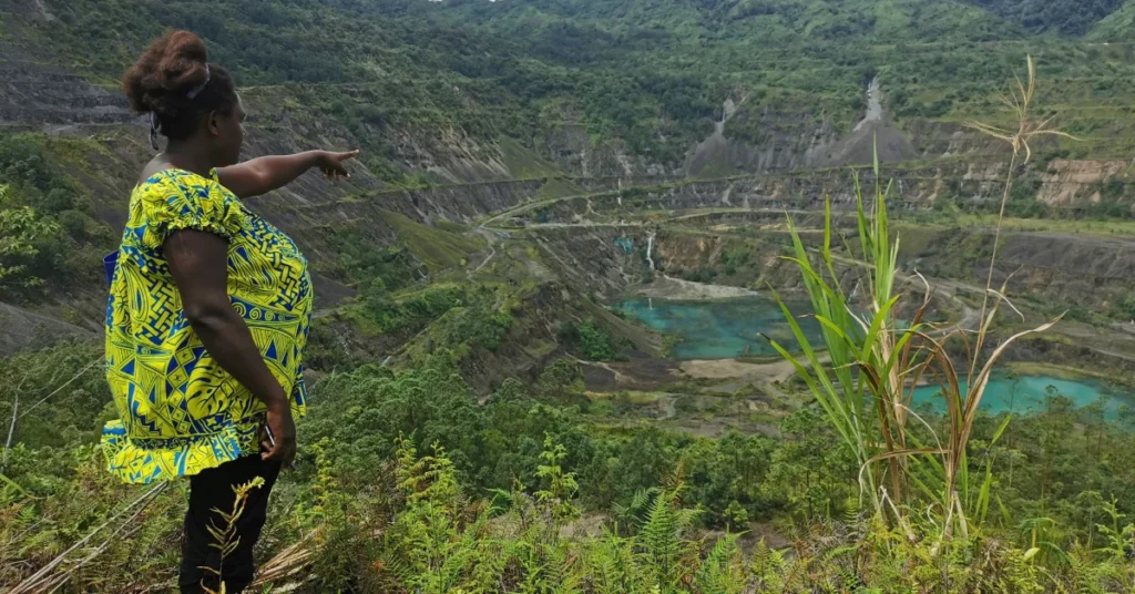 Theonila Roka Matbob overlooking the abandoned Panguna open-pit copper mine in Central Bougainville